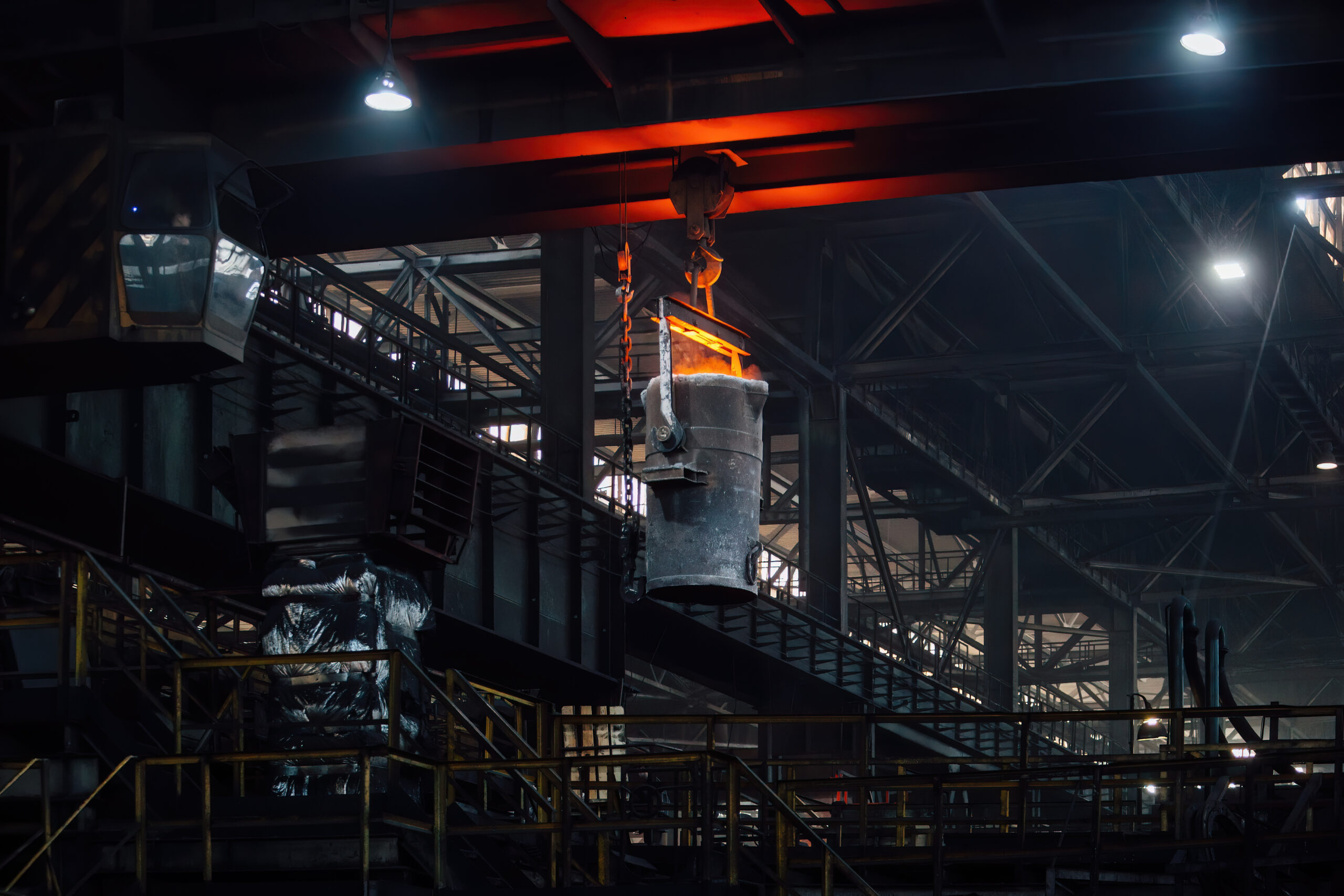 Iron,Casting,At,The,Foundry.,Overhead,Crane,With,Ladle,With