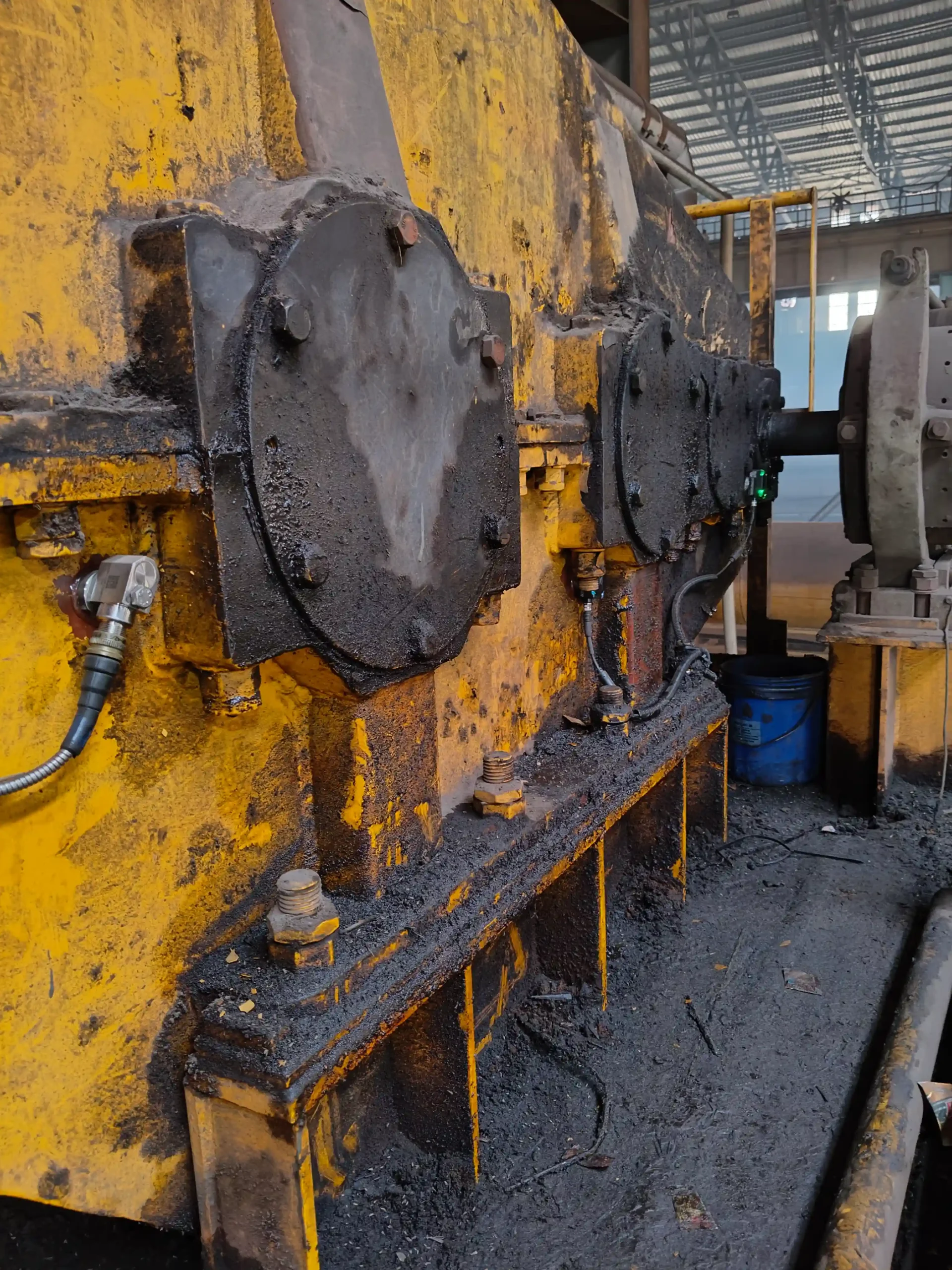 Condition monitoring system installed on an industrial EOT crane gearbox to detect equipment faults and reduce downtime